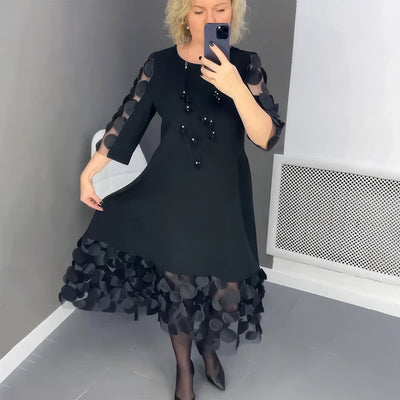 OVERSIZED LONG DRESS WITH DECORATION – ELEGANCE AND COMFORT COMBINED