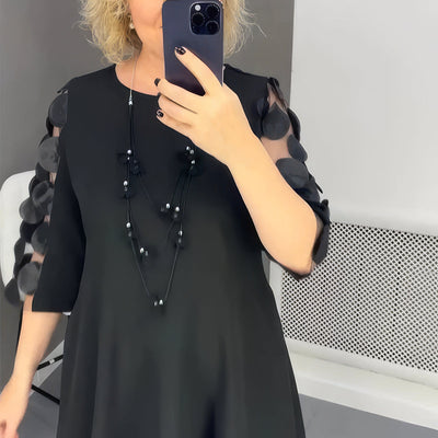OVERSIZED LONG DRESS WITH DECORATION – ELEGANCE AND COMFORT COMBINED